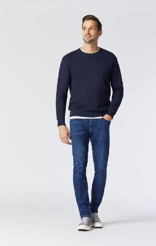Men's Distressed Jeans with Patches for a Retro and DIY - Inspired AppearanceMATT RELAXED STRAIGHT LEG IN DEEP BRUSHED WILLIAMSBURG
