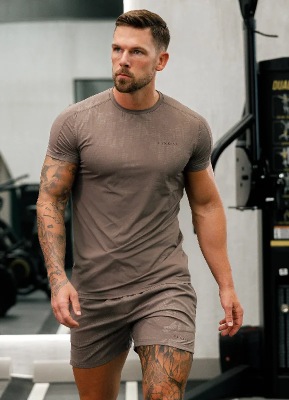 Men's distressed denim - look t - shirts with a rugged appealGym King Debossed Camo Tee - Iron