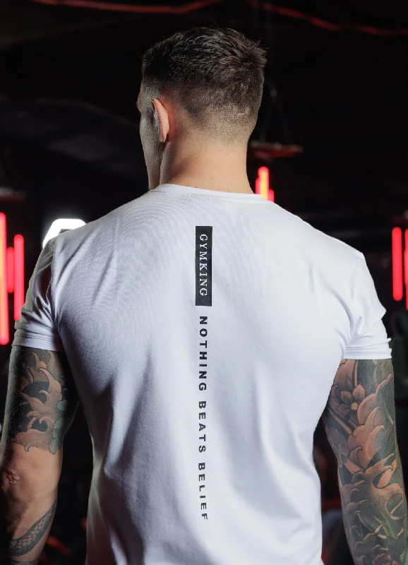 Men's distressed denim - look t - shirts with a rugged appealGym King Nothing Beats Belief Tee - White